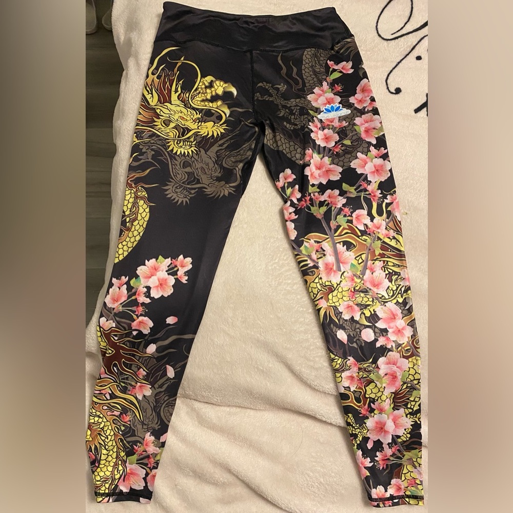 Lotus Leggings floral and dragon pattern size Large only used a few times.